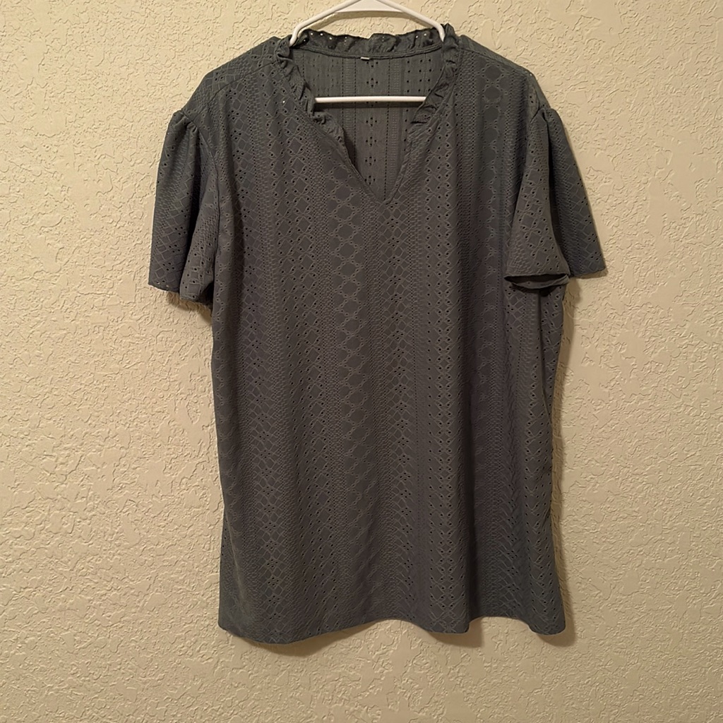 Woman’s Green Blouse.